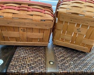 #96	Longaberger baskets (2) red stripped baskets with handles (1) with fabric liner 	 $35.00 
