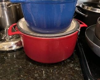 #102	Cooks brand red and blue cast iron porclian coat potss with lids 	 $50.00 
