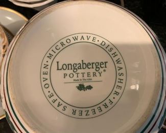 #105	Longaberger christmas bowl with holly 11x5.5	 $30.00 

