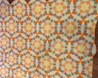 #110	star in the middle of a wedding ring hand  scalloped edge quilted quilt 70x62	 $40.00 
