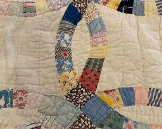 #112	blue/cream double wedding ring quilt scalloped edge  hand quilted 74x65	 $75.00 
