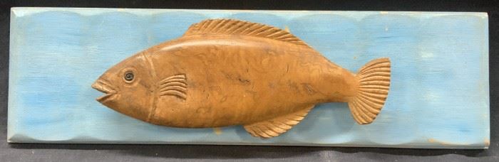Polished Carved Wooden Fish On Painted Panel
