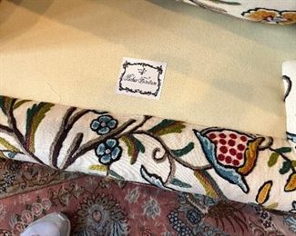 Pair of Baker crewel wing chairs 