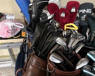 25 bags of Ping golf clubs