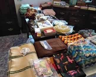 ARMOIRE, NIGHT STAND, LAMPS, LUGGAGE,VINTAGE LUGGAGE, AVON COLLECTABLES, BEDDING, BLANKETS, BILFOLDS, HUNTING BAGS, PURSES, PARFUME, DRESSER AND MIRROR, FLOWERS, CROCHET AFGAHN, SHELF KNIVES, PEABODY ITEMS