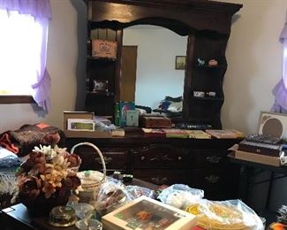 ARMOIRE, NIGHT STAND, LAMPS, LUGGAGE,VINTAGE LUGGAGE, AVON COLLECTABLES, BEDDING, BLANKETS, BILFOLDS, HUNTING BAGS, PURSES, PARFUME, DRESSER AND MIRROR, FLOWERS, CROCHET AFGAHN, SHELF KNIVES, PEABODY ITEMS