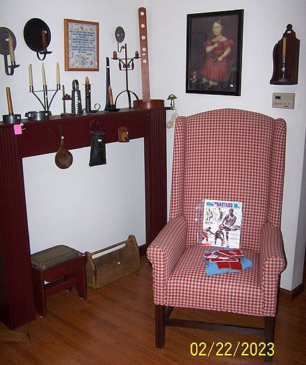 Pine fireplace mantle, high back chair