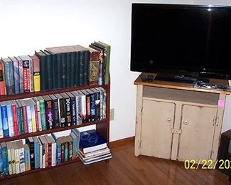 TV, small pine cupboard, bookshelf, 10 volume set 1890's James Fenimore Cooper novels