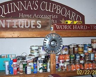 Assorted paints and stains, signs (McQuinna's Cupboard sign is not for sale)