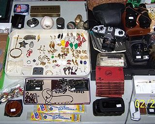 Smalls including jewelry, rosaries, lighters, sporting ticket stubs and more