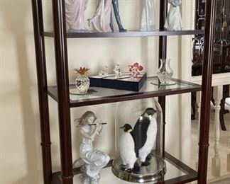 Open Glass Lighted Bookshelf.  Lladro figures and more