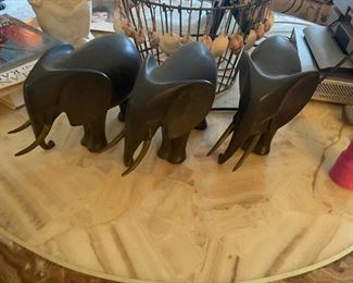 . . . this elephant trio might be made of onyx -- very heavy -- it ain't heavy, it's my elephant trio!