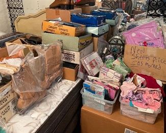 Misc items including new mens & women’s cowboy boots. 