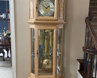 . . . magnificent grandfather clock imported from Belgium