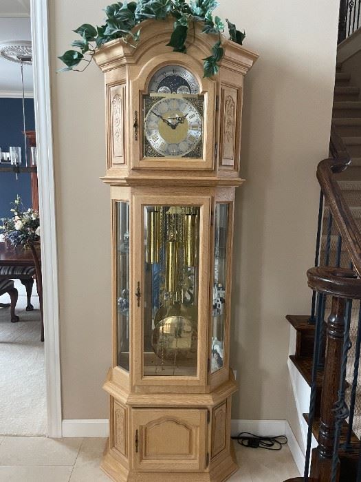 . . . magnificent grandfather clock imported from Belgium