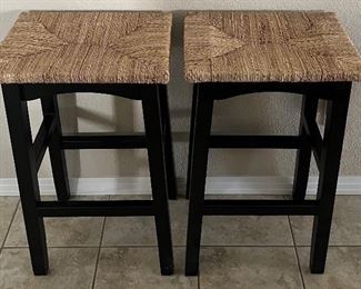 Pair Of 30.5 Inch Black Bar Stools With Woven Rattan Seats