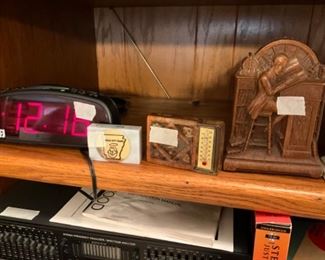 Items in and on large entertainment center 