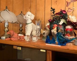 Items in and on large entertainment center 