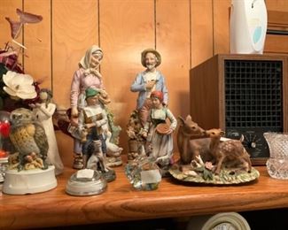 Items in and on large entertainment center 