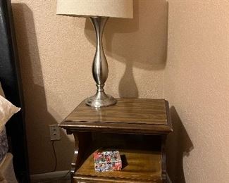 Silver lamp with round lamp shade.  Measurements for wooden night stand is 20 1/4" long x 25" tall with shelf and one drawer.