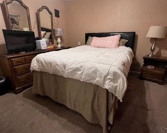 Bedroom suite with dresser, nightstand and armoire 2 mirrors and queen sized bed  mattresses  headboard-well made and in good shape