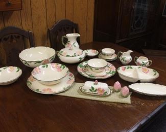 Desert Rose Set    18 large dishes-12 small dishes-16 teacups-16 teacup plates-5 small bowls-6 small plates-14 tiny bowls-1 large salad bowl-1 medium serving bowl-1 small serving bowl-1 serving bowl with lid-1 butter dish-1 set salt & pepper-1 pitcher-1 large bowl with divider-1 trinket dish-cream and sugar set           