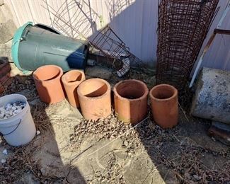 Terra Cotta pipes, yard roller, tomato cages