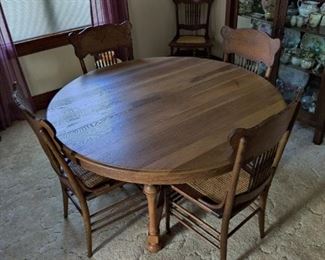 Antique wood table and matching chairs
