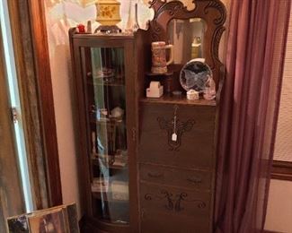 antique hutch, lamp, and collectables
