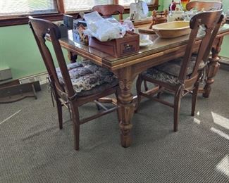 antique dining room table with extendable sides and chairs