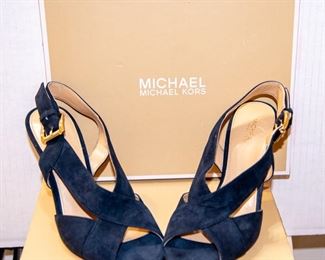 THREE RACKS of Lady's clothing