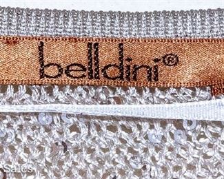 THREE RACKS of Lady's clothingDesigner Clothing