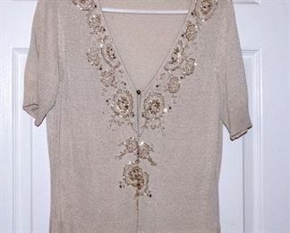 THREE RACKS of Lady's clothingDesigner Clothing