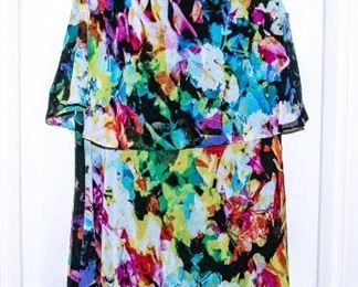 THREE RACKS of Lady's clothing