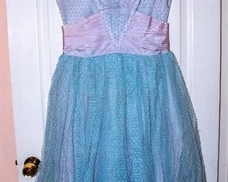 THREE RACKS of Lady's clothing