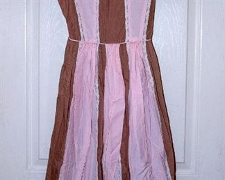 THREE RACKS of Lady's clothing