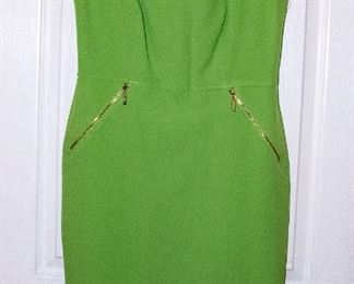 THREE RACKS of Lady's clothing