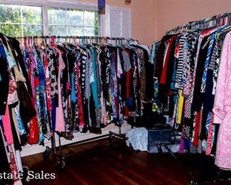 THREE RACKS of Lady's clothing