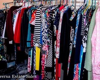 THREE RACKS of Lady's clothing