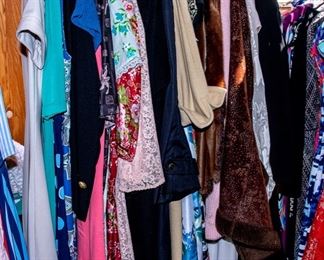 THREE RACKS of Lady's clothing