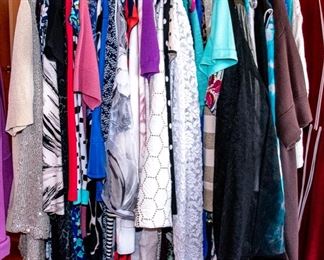 THREE RACKS of Lady's clothing