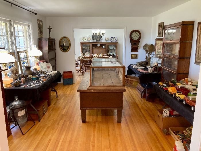 Antique general store display case (with original wavy glass) and base