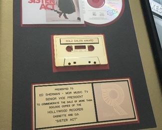 $150 - Original gold record/cassette for the movie featuring Whoopi Goldberg given to the producer