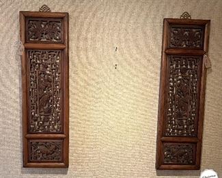 Two antique wooden Asian art panels.