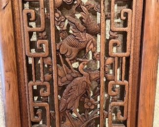 Close up of center of an Asian art panel.