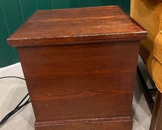 Antique potty chair. Was being used as a side table.