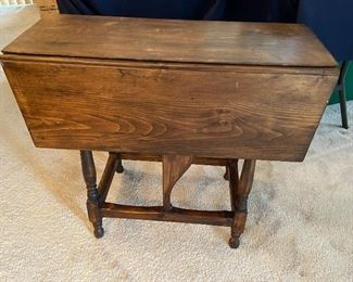 BUY IT NOW! $200. Antique drop leaf table; 10”w x25”h folded