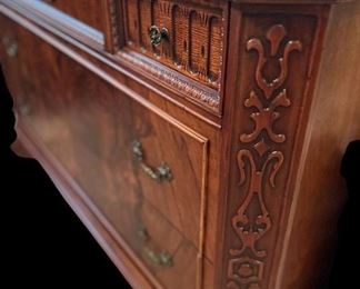 Antique Chest of drawers, intricate wood carving.