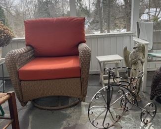 Swivel wicker rocker 