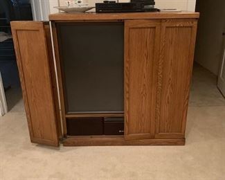 Large Liqud T.V. with cabinet 